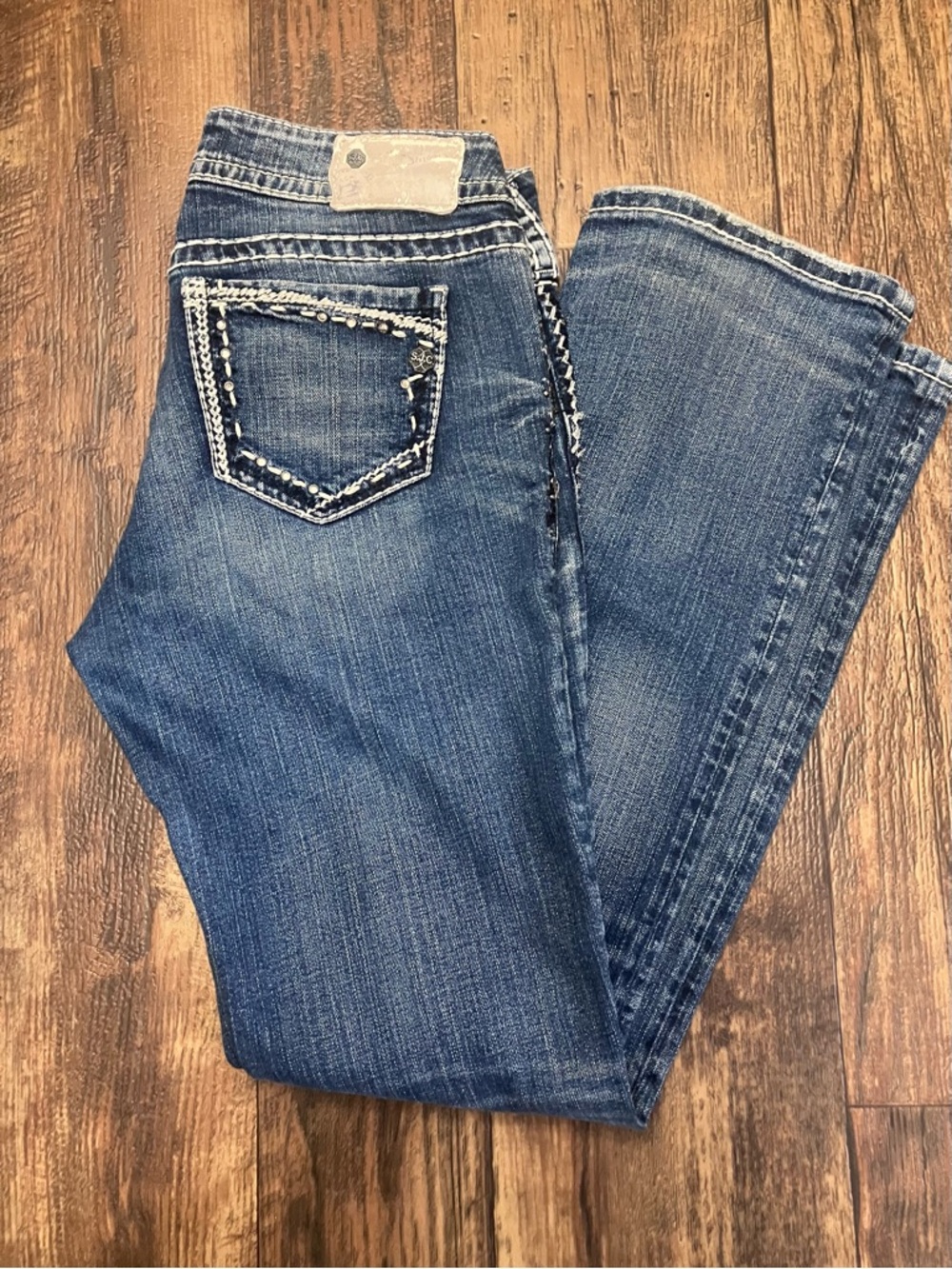 Silver Jeans Medium Blue Bootcut Jeans with Embellished Back Pocket